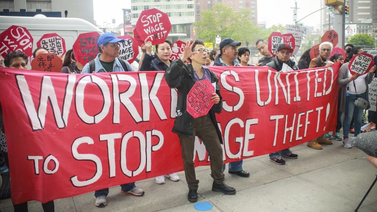 JoAnn Lum on the picket line. May 5, 2015, photo by NMASS (National Mobilization Against Sweatshops)